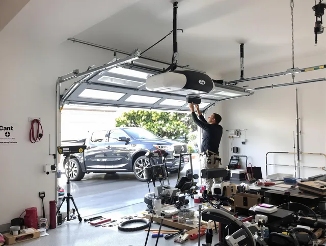 Rockland Garage Door Repair specialist installing smart garage door opener system in Rockland home