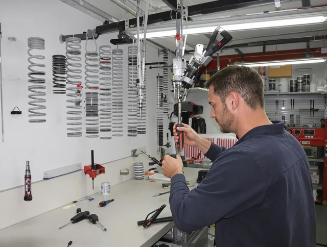 Rockland Garage Door Repair safety certified technician performing precision spring replacement in Rockland
