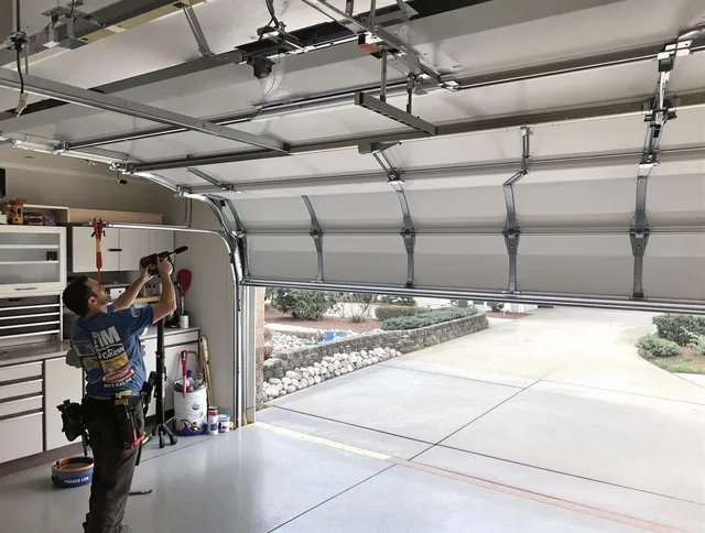 Garage door track repair service by Rockland Garage Door Repair in Rockland